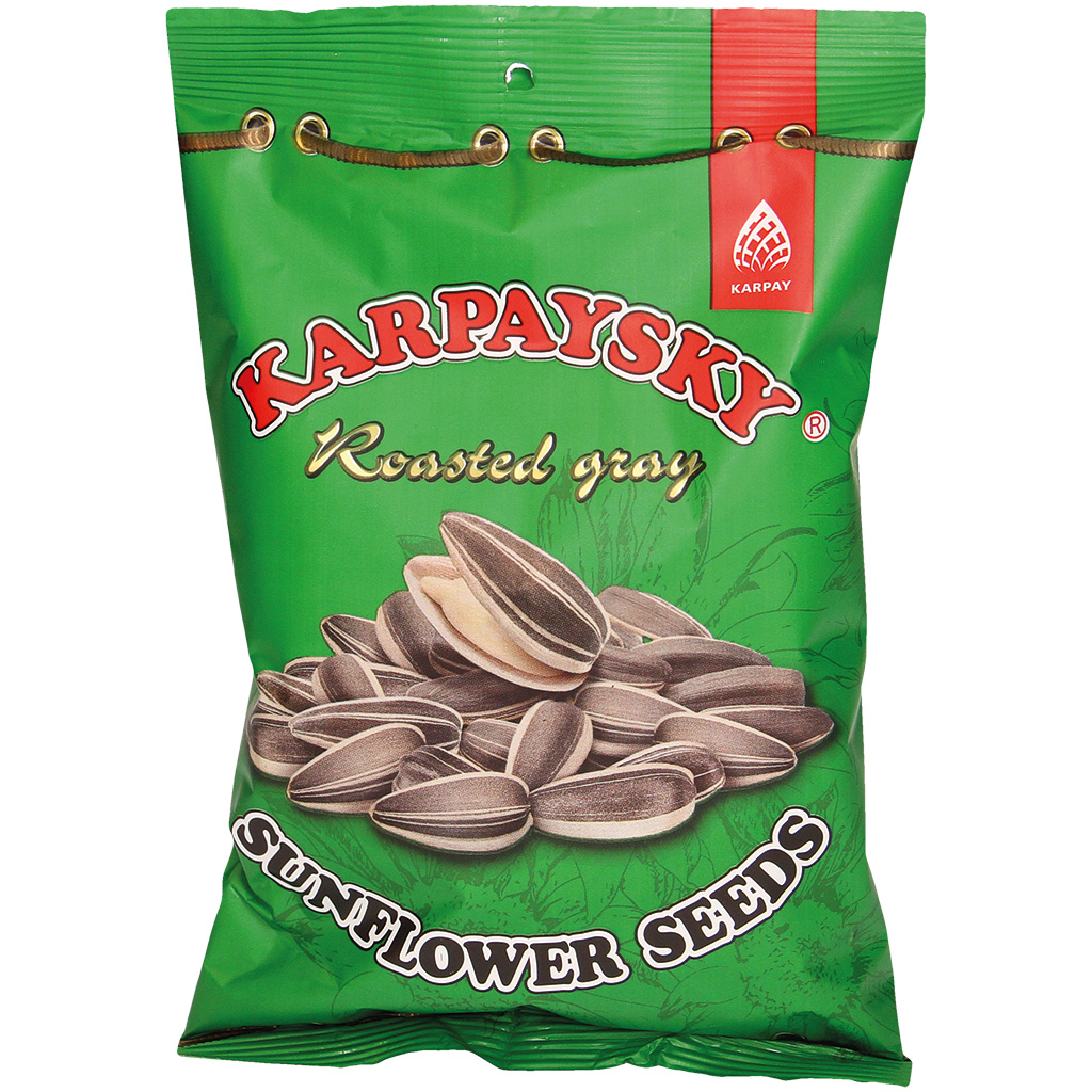 Geroosterde grijze zonnebloempitten met schaal