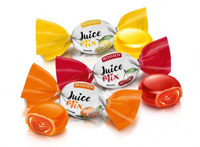 Gevulde harde karamelmix "Juice Mix" met verschillende smaken (sinaasappel, citroen, kers). Vulling 18%.