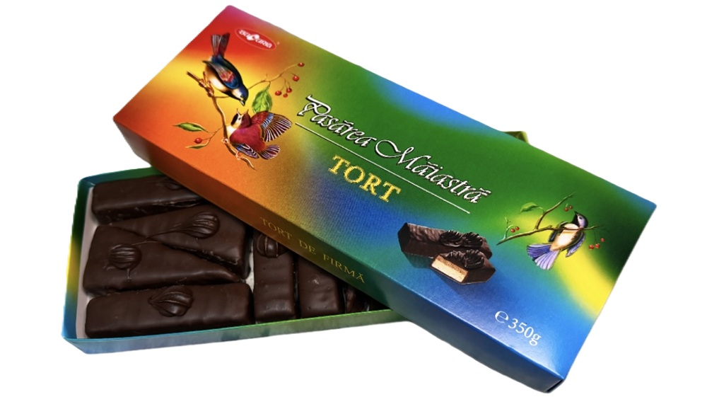 "Tort Pasarea maiastra" Drie-laags schuimsuikerwaren - snoep in cacaovetglazuur. Met lagen van vanille-, citroen- en chocoladesmaak.